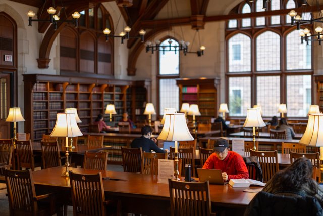 A university library reading room where students study